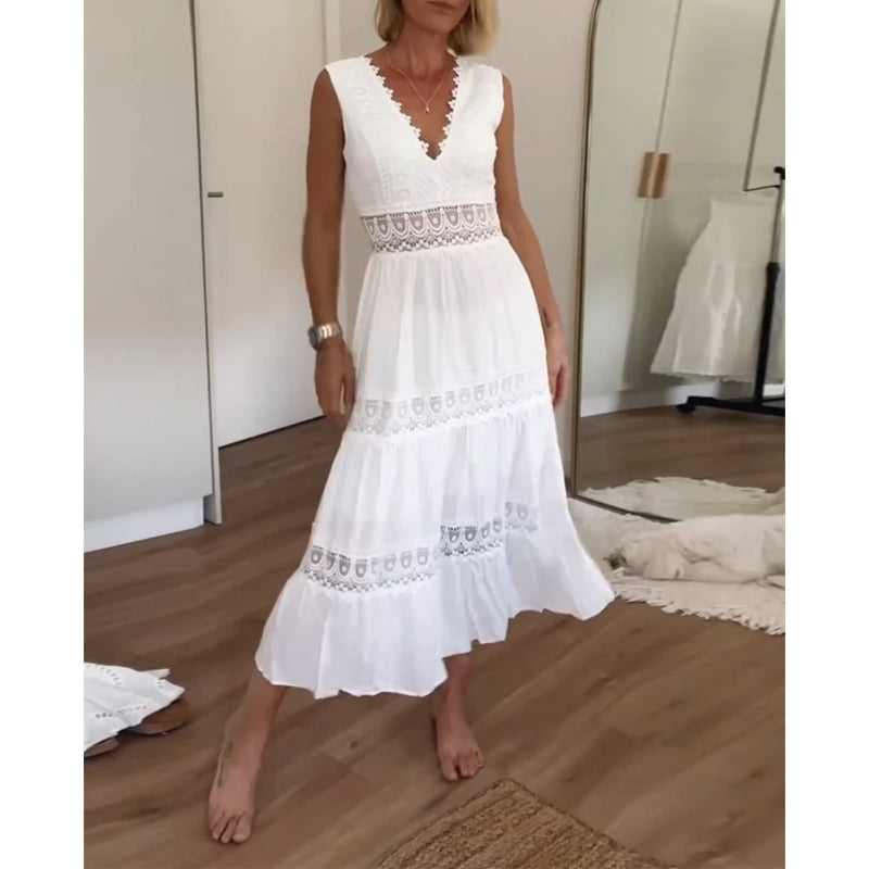 Nowak™ | Elegancka koronkowa sukienka z dekoltem